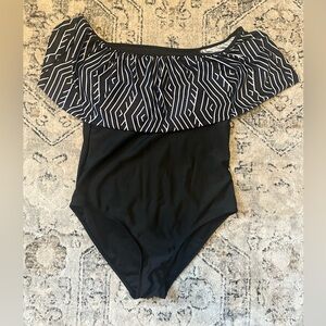 Cupshe black one piece swim suit with chevron ruffle detail